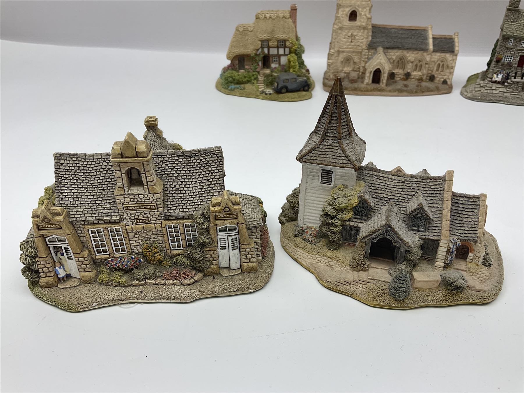 Twenty five Lilliput Lane, to include Village School, Greensted Church, The Chocolate House etc 