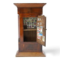 19th century clock trunk cupboard, veneered front with cantered corners, stepped plinth base