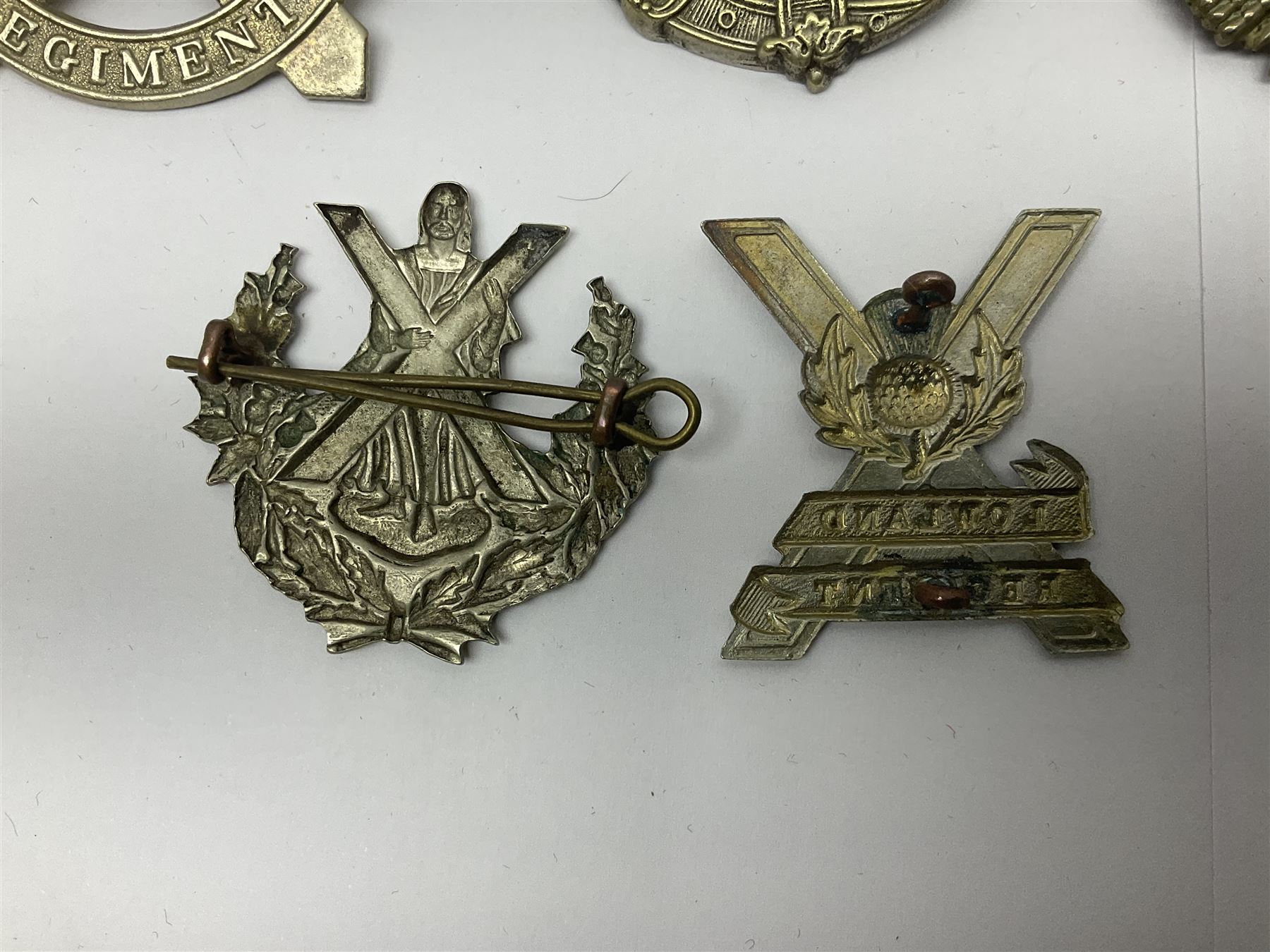 Nine Scottish glengarry badges - 6th Fifeshire Volunteer Battalion Black Watch, Lowland Regiment, Highland Regiment, Black Watch, Argyll & Sutherland Highlanders, Kings Own Scottish Borderers, Cameron Highlanders, The Royal Scots and London Scottish (9)