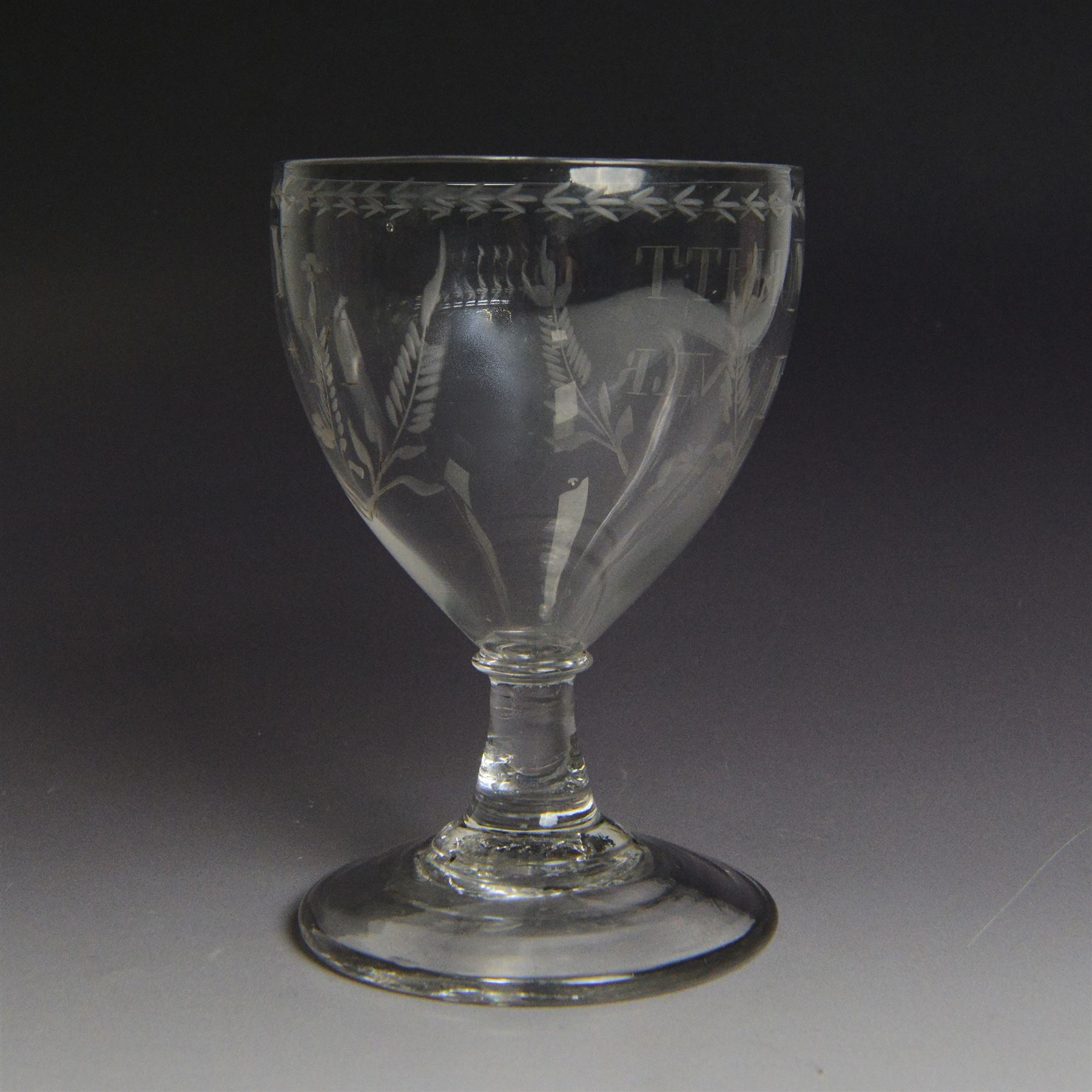 CH SALE 2026 - Dutch engraved Newcastle light baluster glass, circa 1760, the funnel bowl engraved with a two storey country house and church flanked by trees, beneath the inscription ‘T WELVAREN VAN LANDT ENKERK’ (The prosperity of the Country and Church), upon a multi knopped stem with beaded knop and basal knop, over conical foot, H18cm



