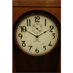  20th century IBM Model 13-7 Electric slave clock, No.15255, circular white Arabic dial with subsidiary seconds, in oak case with glazed door, chromed pendulum, H160cm, W52cm, D25cm  
