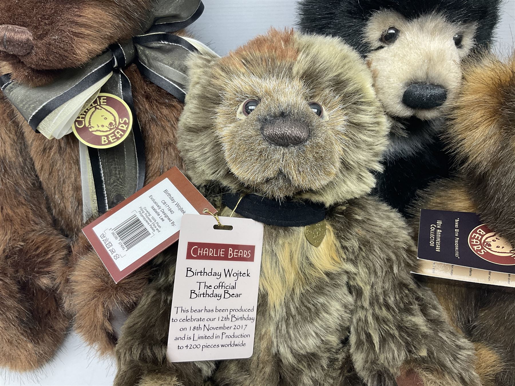 Five Charlie Bears, comprising limited edition Birthday Wojtek CB171840, limited to 4200, Anniversary Kojak CB161707, and Anniversary William CB151681, each designed by Isabelle Lee, Xavier CB620008, designed by Heather Lyell, and Anniversary Slothy Joe CB151558, all with tags 