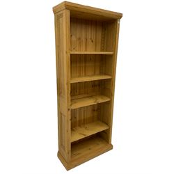 Traditional pine open bookcase, fitted with four adjustable shelves