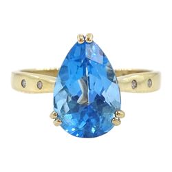 9ct gold single stone pear cut Swiss blue topaz ring, with diamond set shoulders, hallmarked