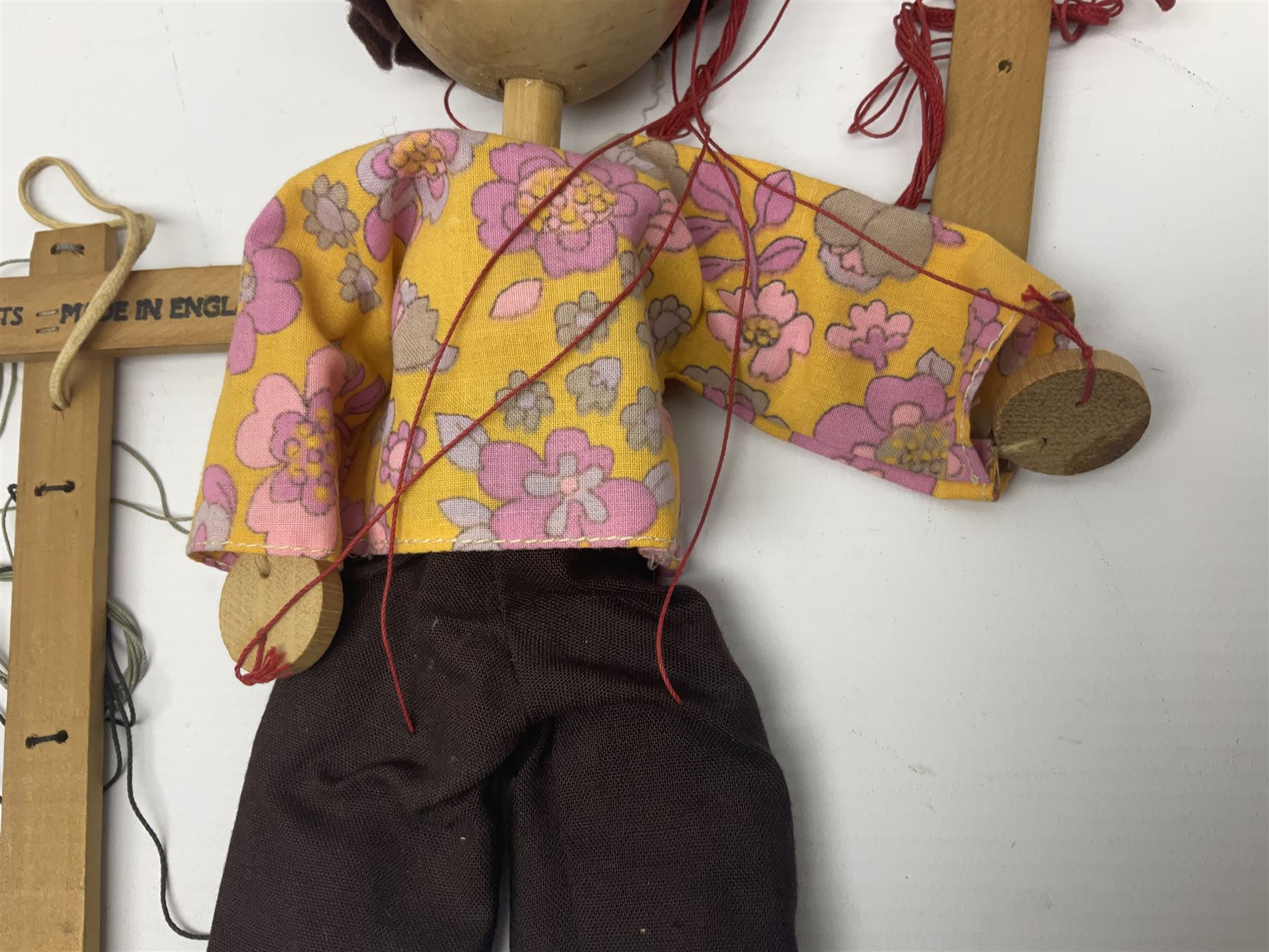 Pelham Puppet - three puppets comprising a painted wooden duck with felt mouth and wings with metal joints H12cm, in original box and instructions; and two further examples Type A cat with a hollow body H12cm, and a boy H23cm (3) 