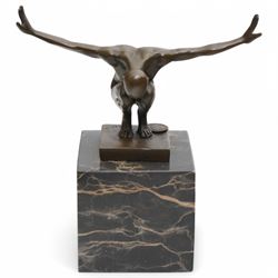 Bronze figure after Milo, a 'Power Of Silence', modelled as a male athlete crouched with arms outstretched upon a marble plinth, signed Milo, H15cm