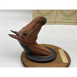 Beswick set of horse head wall plaques 'Champions all', comprising Arkle no.2700, The Minstrel no.2701, Red Rum no.2702, Troy no.2699, all with original boxes