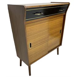 Mid-20th century teak side cabinet, single frieze drawer over sliding doors, on square tapering feet