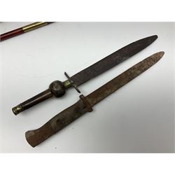 19th century continental folding knife with 15.5cm single edged blade, the pierced brass and iron handle with remains of horn grips L21.5cm overall closed; turned horn handled knife with foliate engraved blade; battlefield relic German 1884/98 knife bayonet; iron spear head; leather covered swagger stick; and two-piece gun cleaning rod