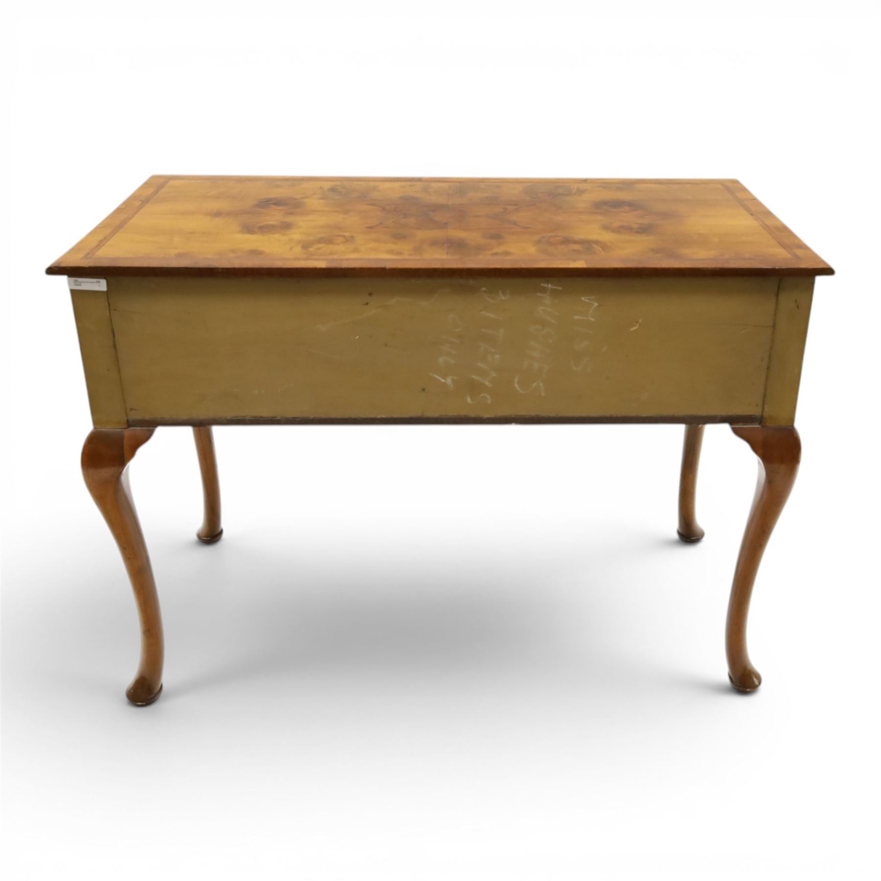 Queen Anne Design walnut kneehole desk with matching chair, rectangular figured top with crossbanding, three frieze drawers, raised on cabriole supports, the chair with serpentine front raised on cabriole supports