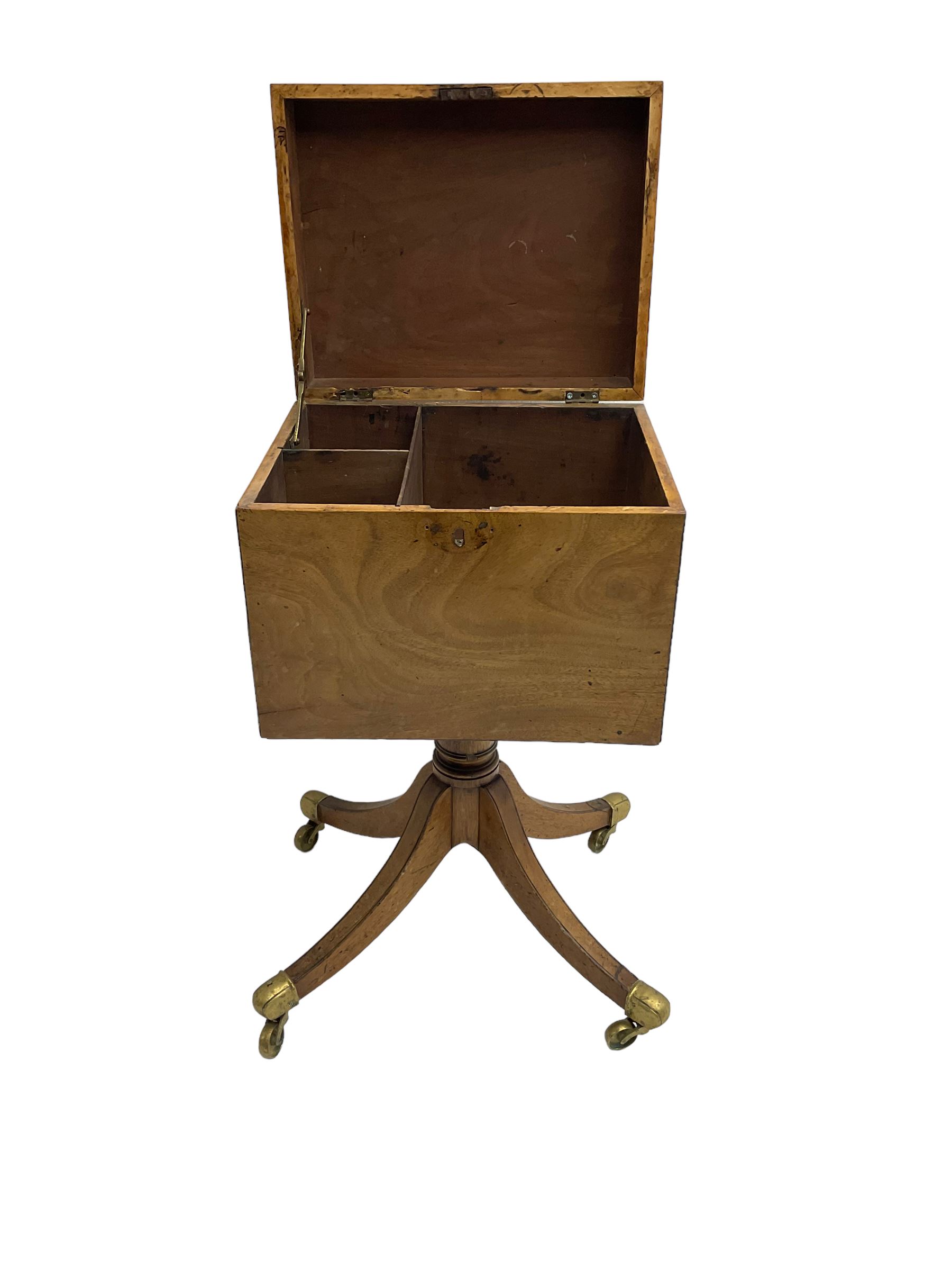 Regency mahogany cellarette on stand, rectangular top with hinged lid, raised on turned pedestal terminating in quadrupod base with brass cups and castors