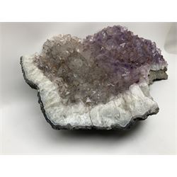 Amethyst crystal geode cluster, with well-defined crystals of various sizes, H13cm, L46cm