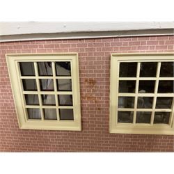 Modern scratch-built Palladian style wooden dolls  house as a 19th century double fronted two-storey property with simulated brick and stone walls under a removable simulated slate hipped roof; the triple hinged front elevation opening to reveal six rooms with central hall, stairs and landing L94cm H56cm D40cm