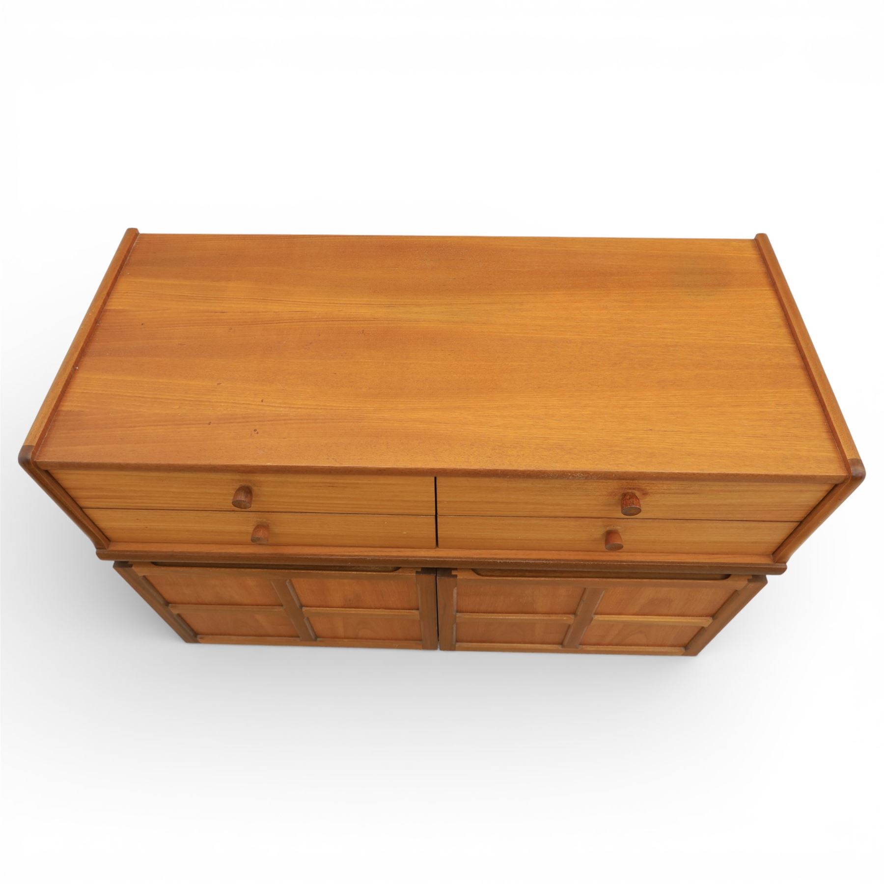 Nathan - 'Squares' pair of sideboards, rectangular top over four short drawers, above signature square panelled cabinet doors on a recessed plinth base