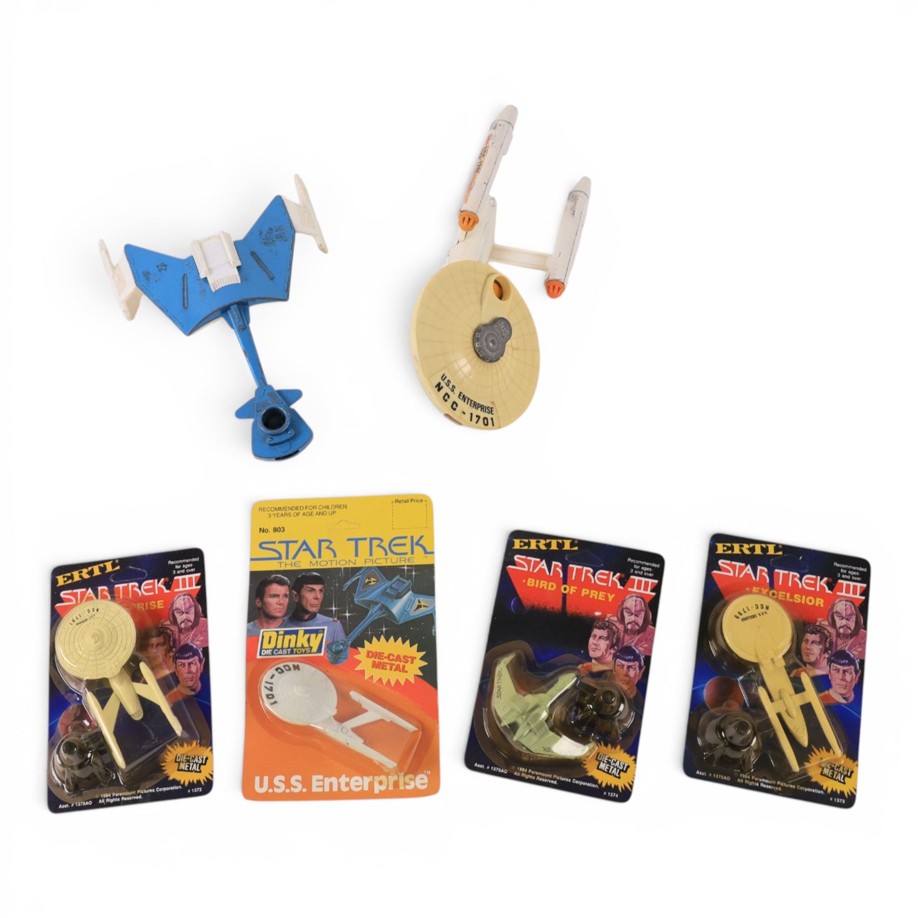 Star Trek diecast vehicles, comprising Dinky USS Enterprise, ERTL Bird of Prey, Excelsior and Enterprise, all carded and two loose Dinky models