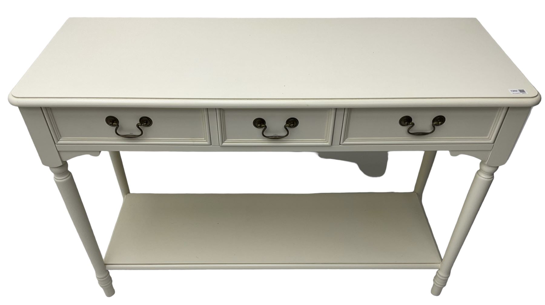 Laura Ashley - 'Clifton' ivory finish three drawer console table, fitted with three frieze drawers with heavily moulded edges, raised on turned supports united by undertier