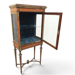 French kingwood display vitrine, rectangular glazed case with baized lined interior, parquetry banding and gilt metal bead mounts, applied gilt metal foliate corner mounts, raised on turned supports united by shaped undertier stretchers