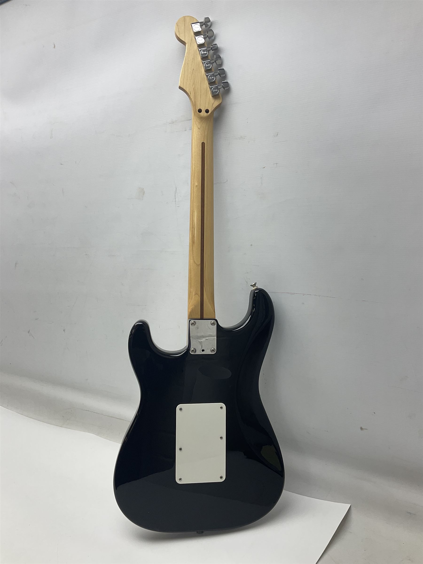 Mexican Fender Stratocaster electric guitar in black c2003 with Floyd Rose tremolo system, serial no.MZ3129600; L98cm; in Freestyle fitted case with 2006 Diamond Anniversary booklet