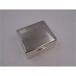 1930s silver mounted cigarette box, of square form, with engine turned decoration and blank rectangular panel to hinged cover, opening to reveal softwood lined interior, hallmarked William Neale & Son Ltd, Birmingham 1934, H3.8cm