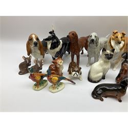Beswick figures to include, english setter 'Bayldone Baronet', model no 973, collie, model no 1791, sheepdog, model no 1792, black labrador, model no 1548, Irish red setter, model no 966, Connoisseur Beagle on a wooden plinth 1933B, frog in cream matt, model no 368, etc 