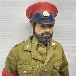 Palitoy Action Man Action Soldier No.34014 with tunic, belt, trousers, boots, blue beret and sten gun; in original box; and Palitoy Action Man Royal Military Policeman (RMP) gripping hands figure, marked 'Made in England by Palitoy under licence from Hasbro © 1964' to rear of torso; with tunic, shirt, trousers, tie, boots, belt, truncheon, pistol in holster, MP armband, red cap, Sterling machine gun and other clothing etc; in anrelated display box (2)