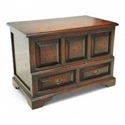 Titchmarsh and Goodwin design miniature oak coffer, rectangular, removable top with projecting panelled front with blind drawers on bracket feet 