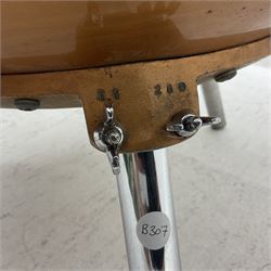 Timpani drum with coppered finish to the bowl, three adjustable tubular legs 'Marked Made in England 71 260' and Remo head D75cm 