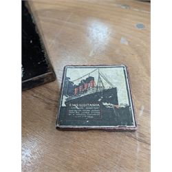 WWI brass shell case, by vendor repute salvaged from SS Cadmus wreckage site June 2007 off Flamborough Head, together with a reproduction RMS Lusitania medal in box and a metal tin