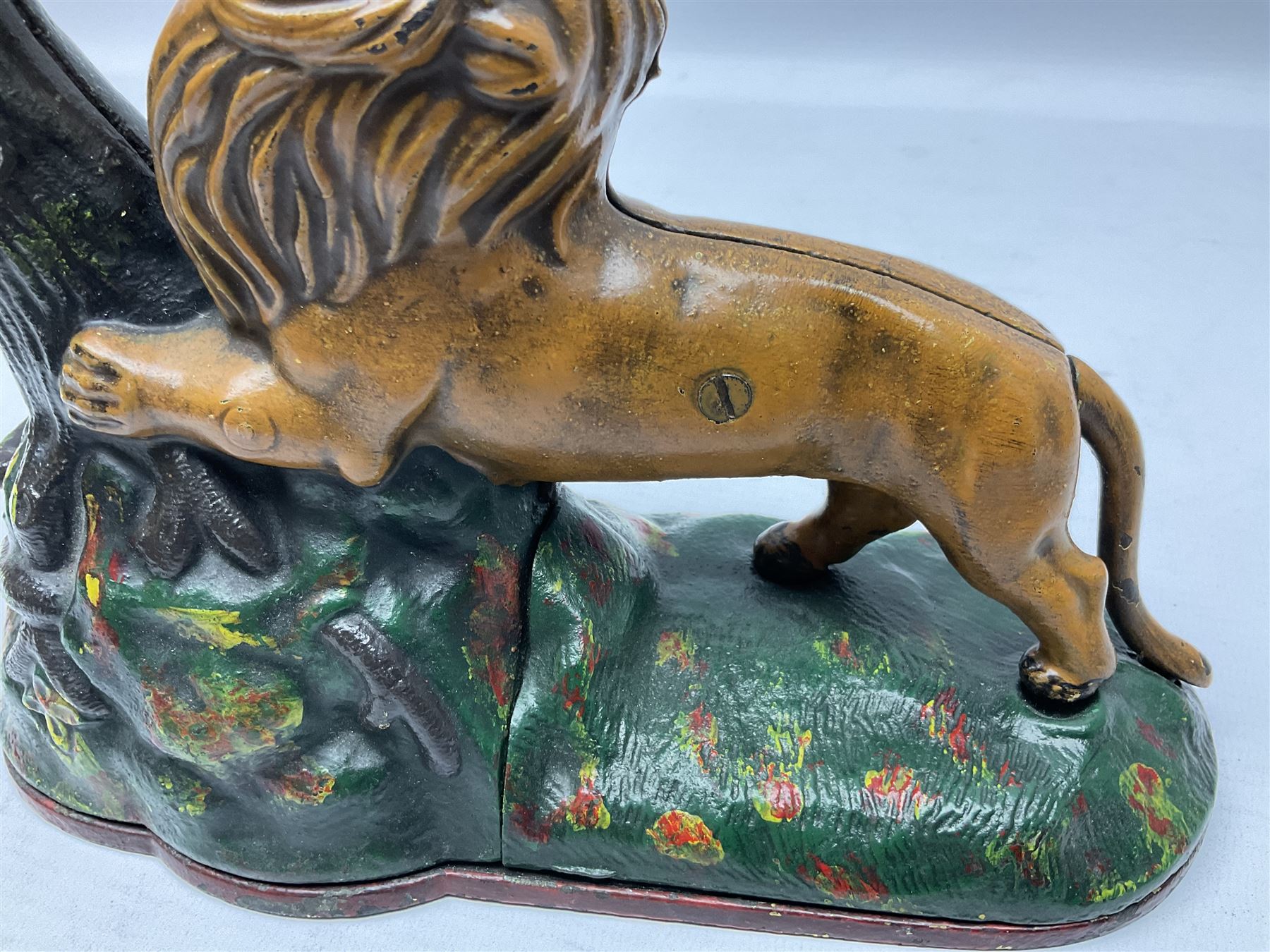 Late 19th century cast-iron mechanical money bank 'Lion and Two Monkeys' by Kyser & Rex with impressed patent mark for 17th July 1883 H25cm L23.5cm