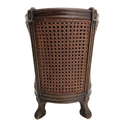 Regency style circular mahogany and cane-work waste paper basket, with liner