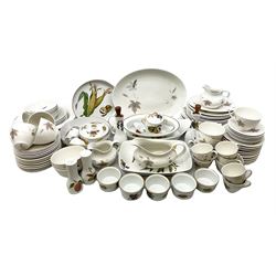 Quantity of tea and dinner wares comprising Royal Worcester 'Evesham' pattern dinnerwares to include lidded tureen, ramekins, dishes etc and Royal Doulton 'Tumbling Leaves' pattern wares to include teacups, dinner plates, etc in two boxes