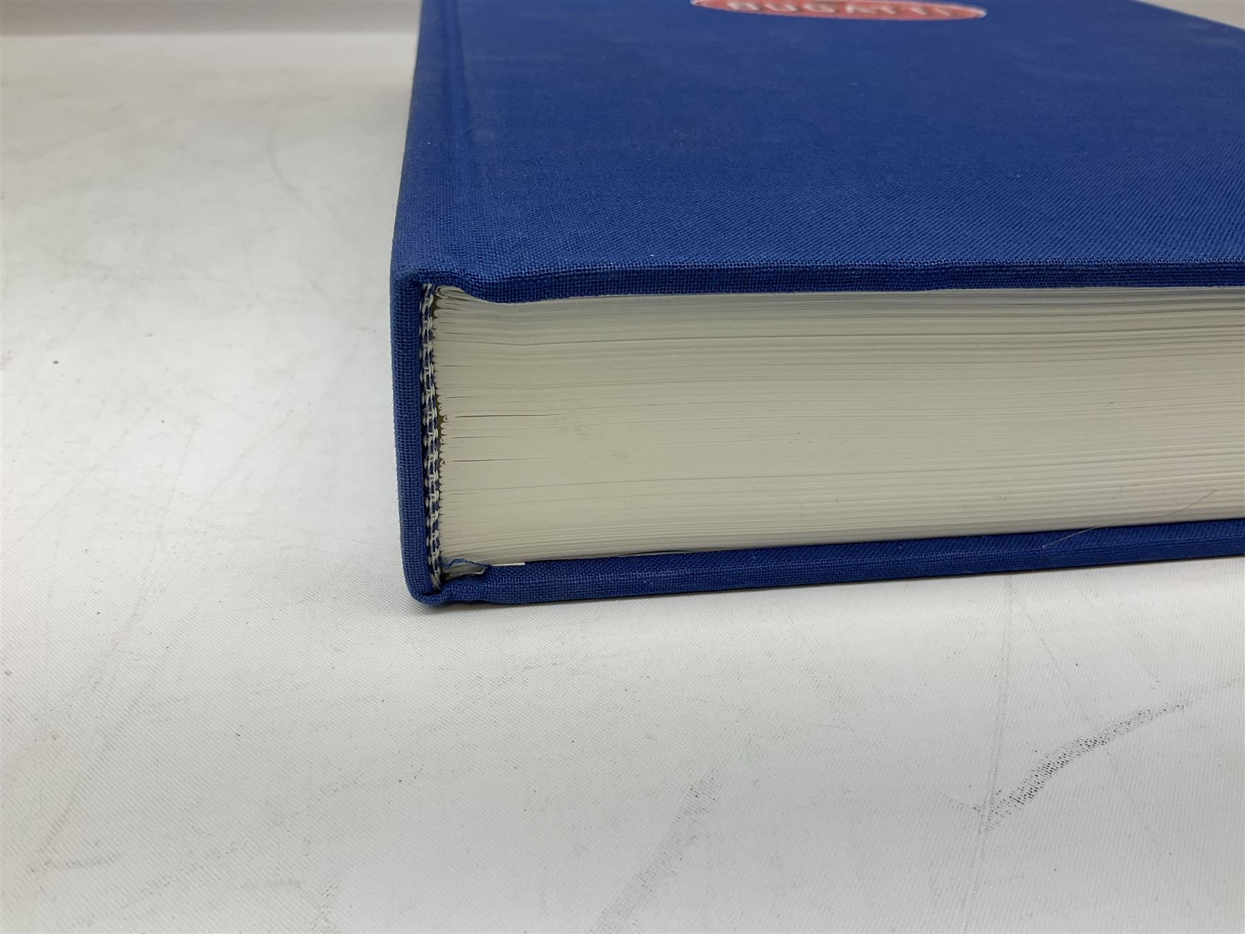 Bugatti Magnum by Hugh Conway and Maurice Sauzay, pub. Foulis Haynes 1989, with original engine turned slipcase with gilt metal label bearing 'Ettore Bugatti Molsheim Alsace', chassis no. 1636, the blue cloth bound book with monochrome and colour plates, limited edition of 2,000