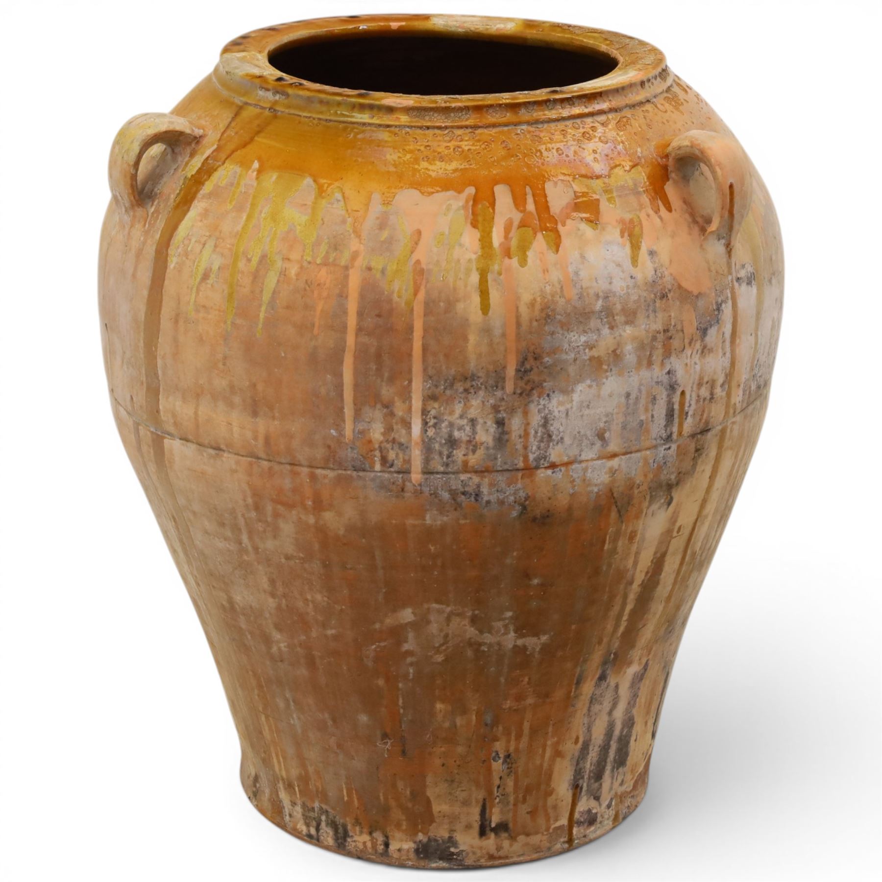 Large Spanish terracotta olive jar, of typical baluster form with drip glaze decoration and three lug handles, with impressed mark fabrica de alfareria, H58cm