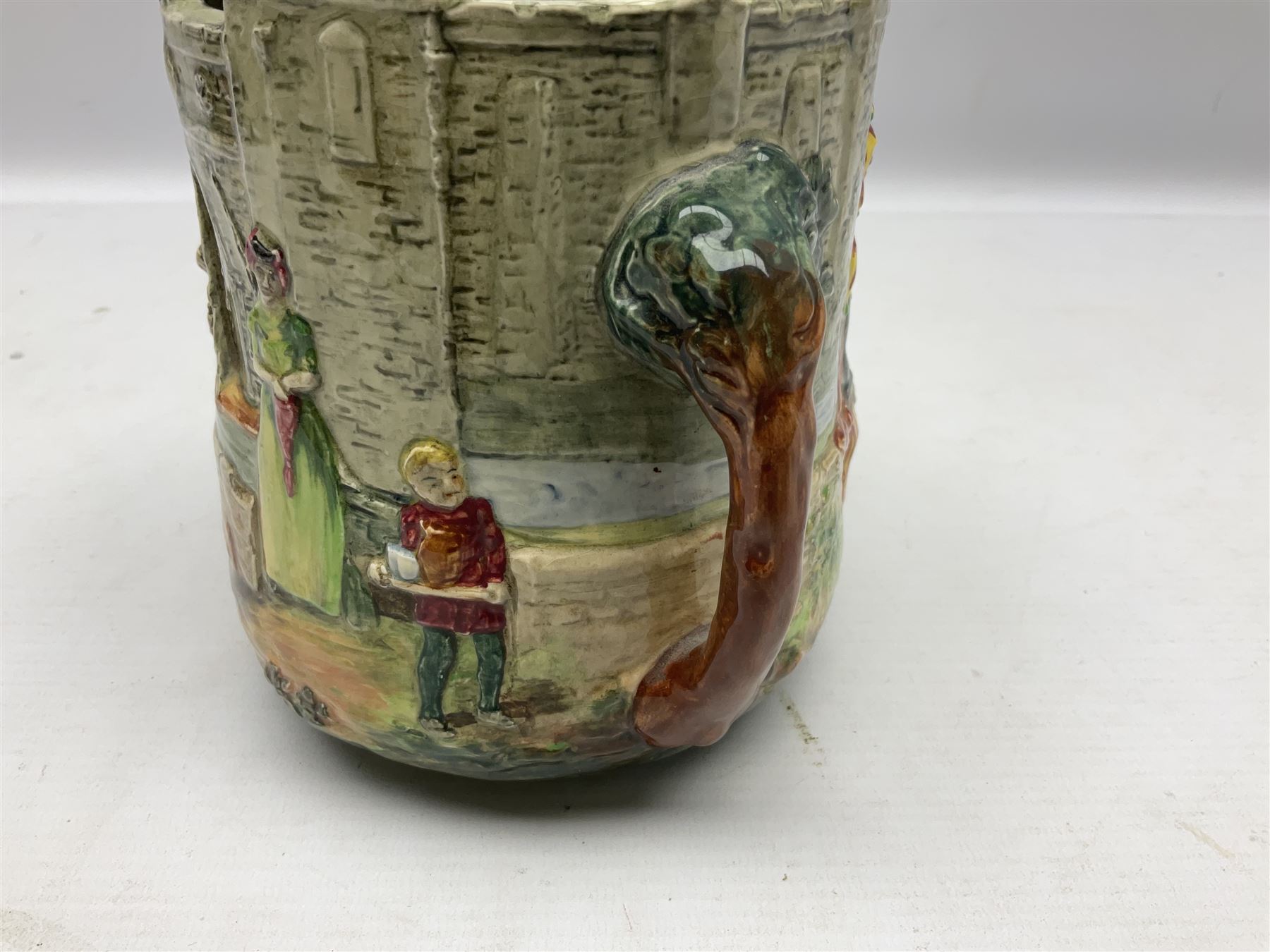Royal Doulton Wandering Minstrel loving cup modelled by Charles Noke, decorated with figures with a castle in the background, mark to base 'A Wandering Minstrel A Merry Man Moping Mum' limited edition 7/600, H14cm