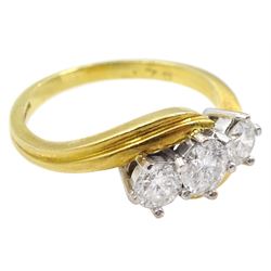 18ct gold three stone round brilliant cut diamond crossover ring, hallmarked, total diamond weight 0.75 carat