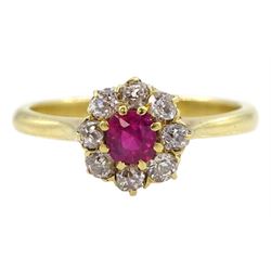 Early 20th century ruby and old cut diamond cluster ring, stamped 18ct