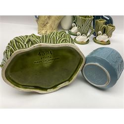 Sylvac budgieregar wall pocket, together with other Sylvac cermics including swan vases, blue tit vase and a frog figure etc, all with printed or impressed marks beneath, and a Poole Pottery cat figure, with printed mark beneath, wall pocket H22cm