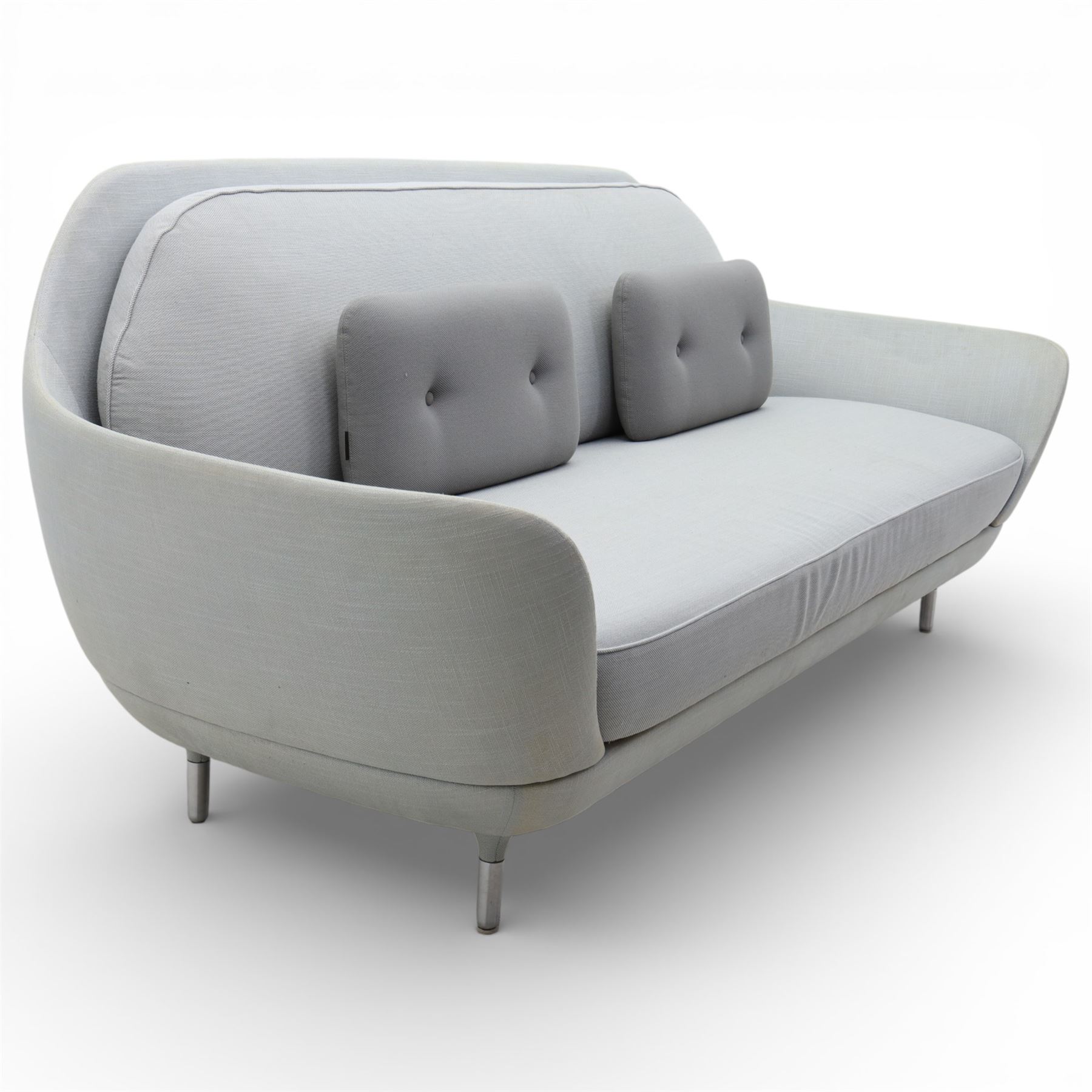 Fritz Hansen - 'Favn' sofa, designed by Jaime Hayon (1974-), upholstered in light grey fabric, the organic curved back and integrated arms enclosing loose seat and back cushions, raised on slender cylindrical metal supports