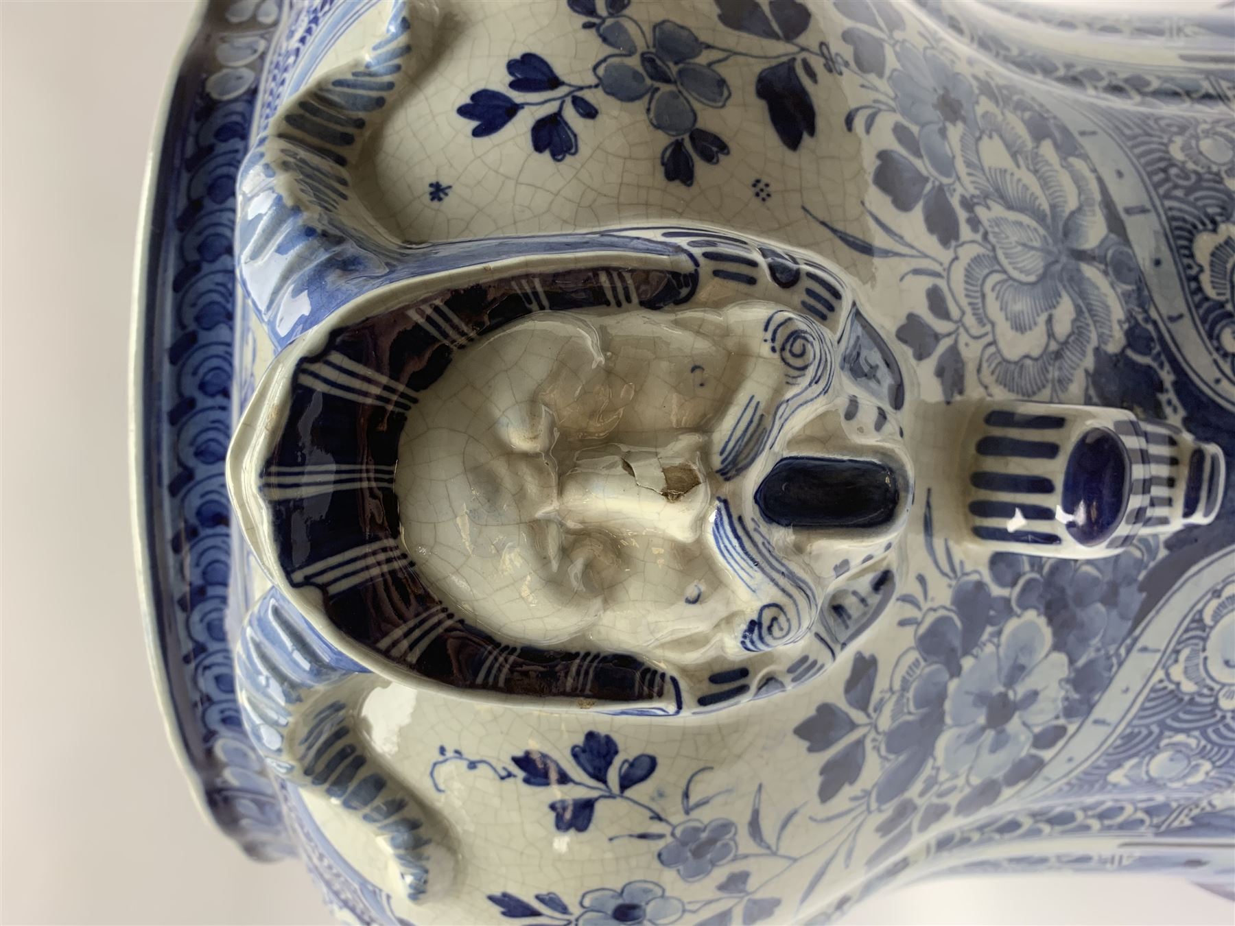 Large 20th century Delft blue and white jardinière, of baluster form with twin zoomorphic mask lug handles, decorated with hand painted panels of waterside scenes, within foliate surround, impressed and painted marks beneath for De Porceleyne Fles workshop, Delft, H35cm, rim D32