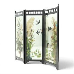 Late Victorian Aesthetic Movement ebonised and painted three-panel folding mirror screen, spindle gallery cresting rail over three rectangular mirror plates painted with floral pond scenes with lily-pads, swallows and kingfishers, each panel W37cm H110cm)