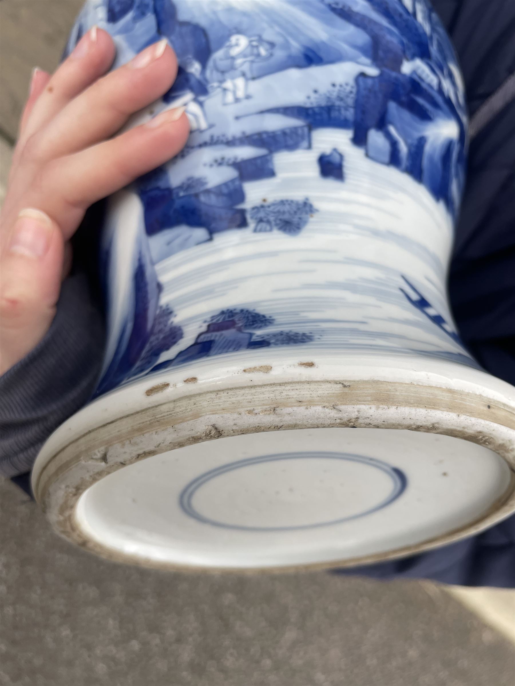 Qing Dynasty Yen Yen blue and white vase in the Kangxi style decorated with a lake landscape surrounded by rocky cliffs, figures in a boat and on the shore H45cm 