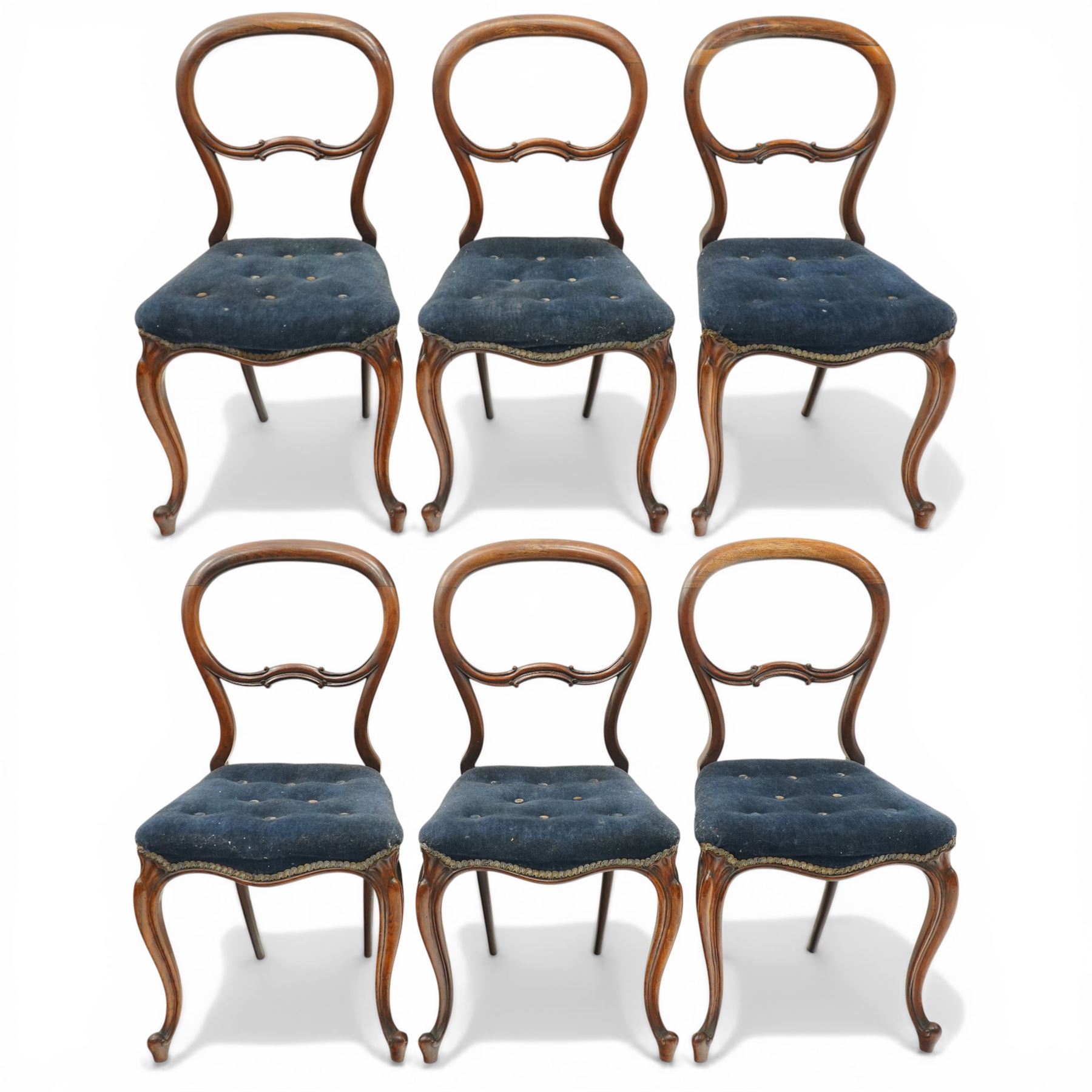Set of six Victorian rosewood balloon-back dining chairs, seats upholstered in buttoned blue fabric, raised on cabriole supports