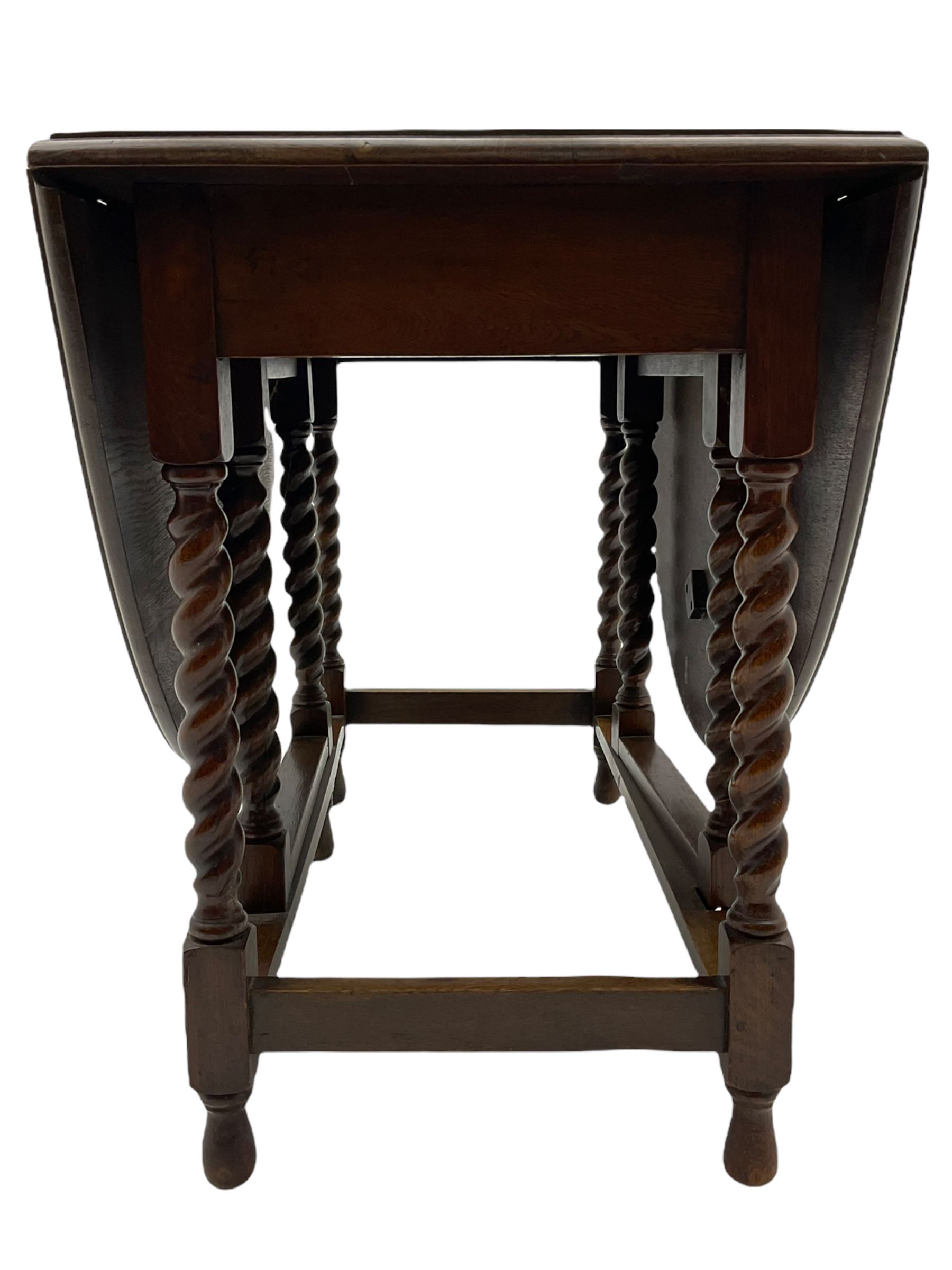 Early 20th century oak barley twist drop leaf dining table (105cm x 154cm, H74cm), and four chairs 