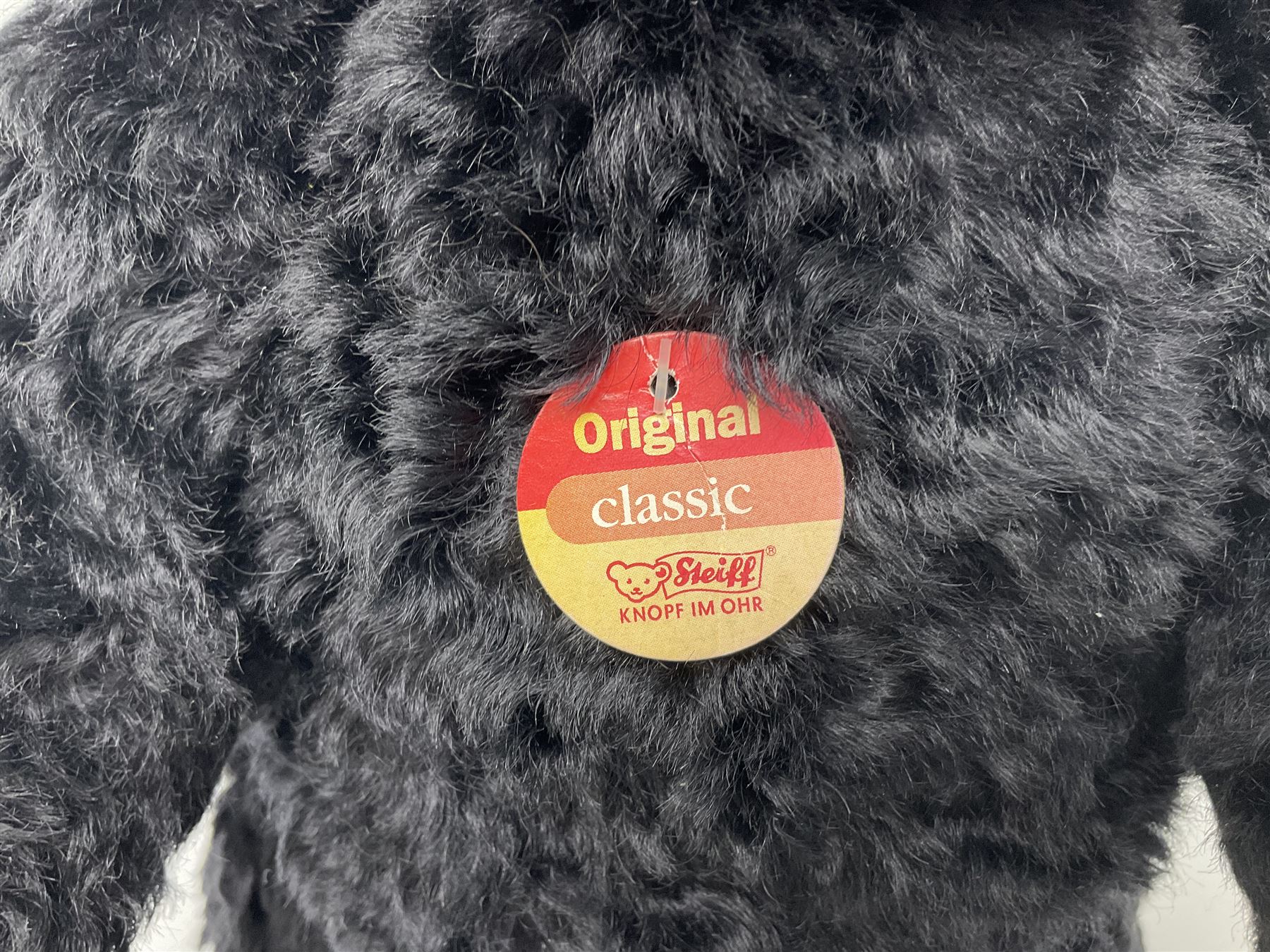 Steiff Classic Teddy Bear in black mohair with working growler mechanism and red stitched detail, H42cm