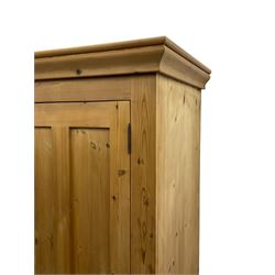 Traditional pine double wardrobe, fitted with two panelled doors