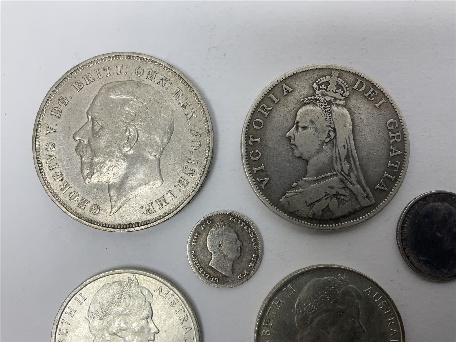 William IIII 1836 fourpence coin, Queen Victoria 1890 double florin, King Edward VII 1904 sixpence, approximately 370 grams of Great British pre 1947 silver coins including King George V 1935 crown and two Queen Elizabeth II Australia 1966 silver fifty cent coins 