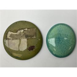 Henry George Murphy (1884-1939), collection of seven Arts & Crafts glazed ceramic roundels, of circular and oval form, five in tones of red and brown and two in tones of blue, turquoise and green in soufflé and high fired finishes, largest example D6.5cm