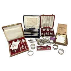 Group of silver to include cased set of six silver handled knives hallmarked Birmingham 1921 by Raeno Silver Plate Co, three hallmarked napkin rings etc together with silver plated and other metalware etc