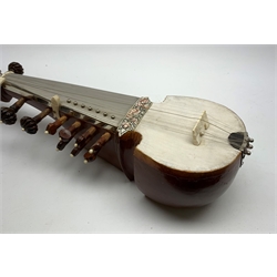 Indian sarangi multi-stringed instrument, the hardwood base with decorative bone inlay and mounts and metal covered fingerboard, L59cm