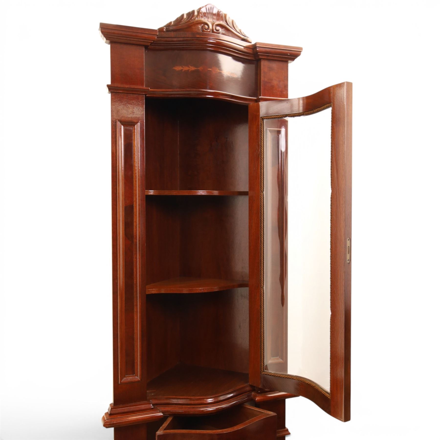 Victorian design mahogany corner cabinet, shaped carved cresting above bowed glazed upper door, with panelled side uprights, lower drawer over cupboard door decorated with floral marquetry, on plinth base